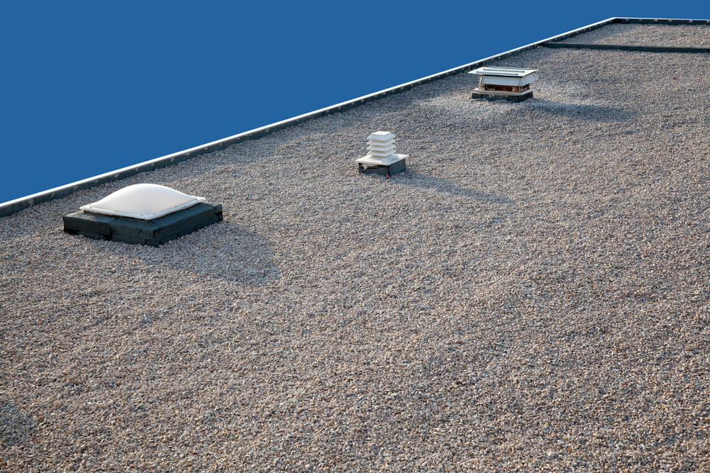 Komín a svetlík na plochej streche | GAMAT